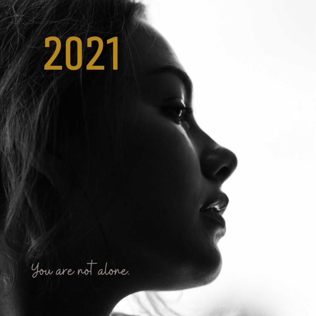 The year "2021 " superimposed over a photo of a young person in profile